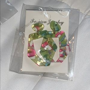 Green and pink dangle earrings